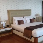 comfortable king bed room jiva resort meghalaya