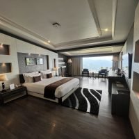 premium-luxury-suite-bedroom-double-bed-mountain-view